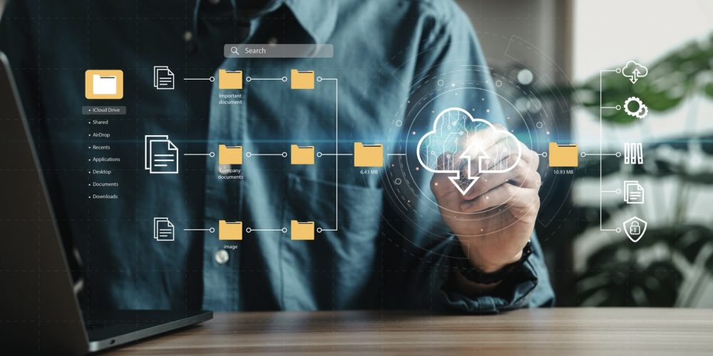 Man using laptop showing cloud computing diagrams digital technology information exchange and future technology ideas Data Document Management System (DMS) Network and Internet Service Concepts